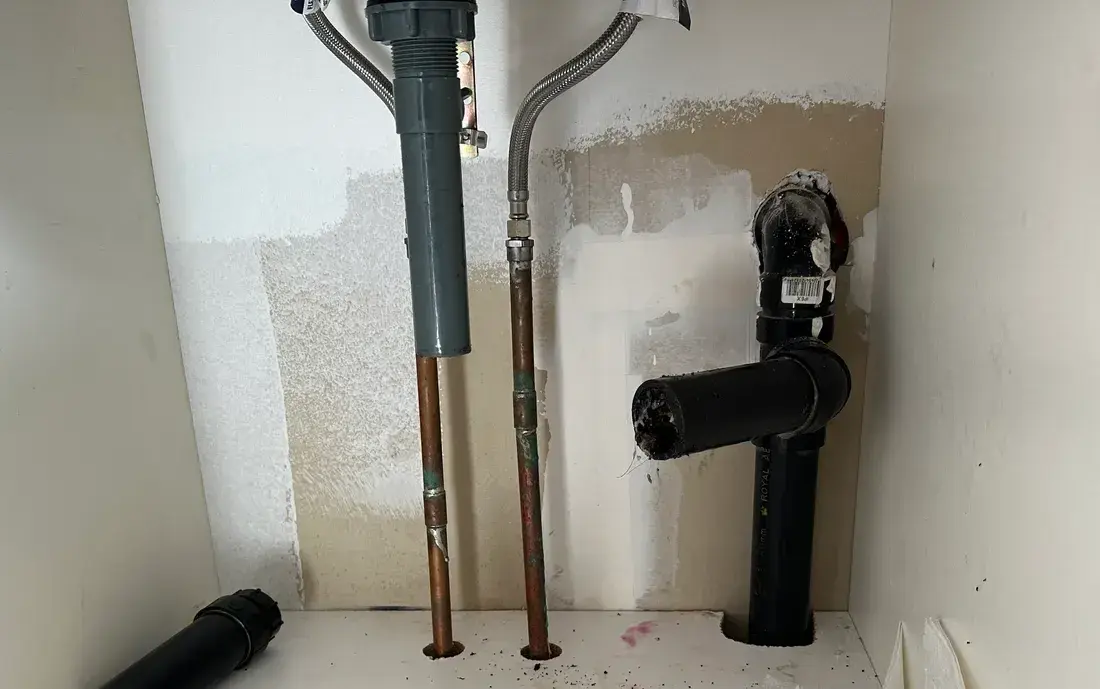 Rebuilt under-sink drain assembly in new ABS with proper unions